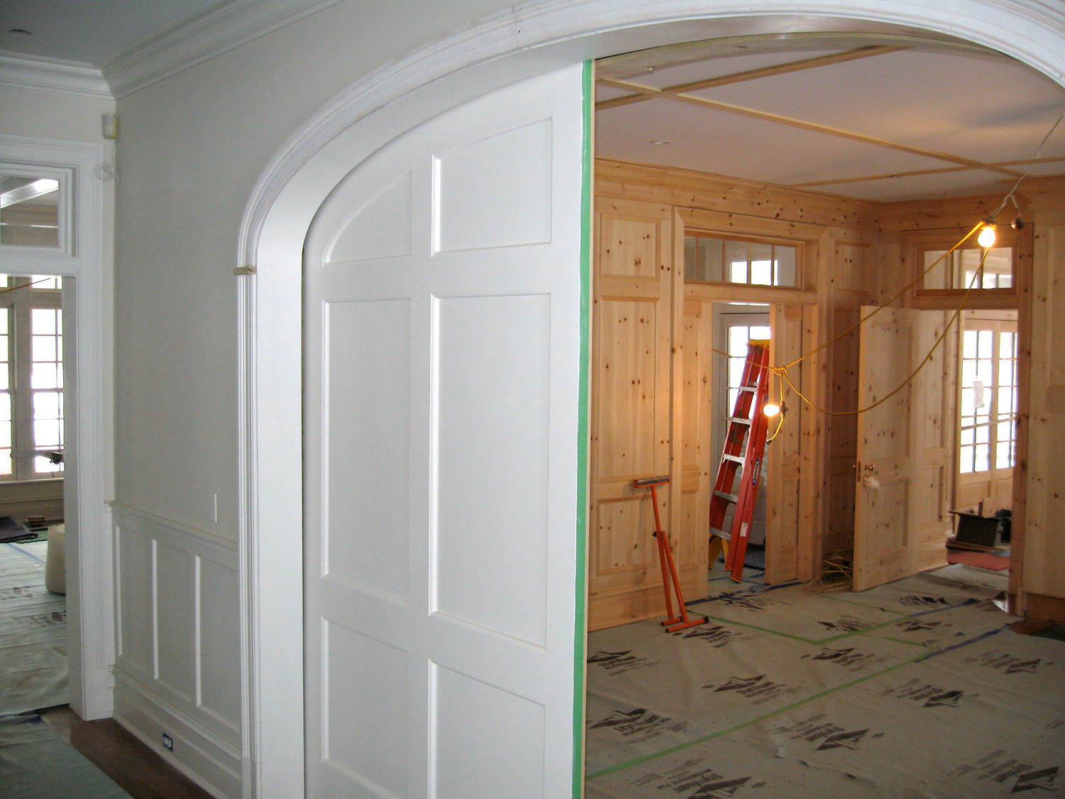 The view looking in to the library. Paint grade panel doors. Hillsdale, NY.